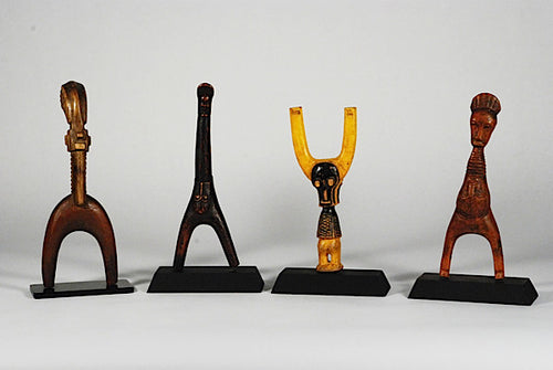 Four exceptional Baule, Ivory Coast, wooden slingshots