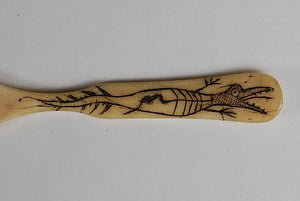 Engraved Inuit bone spoons