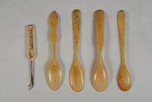 Engraved Inuit bone spoons