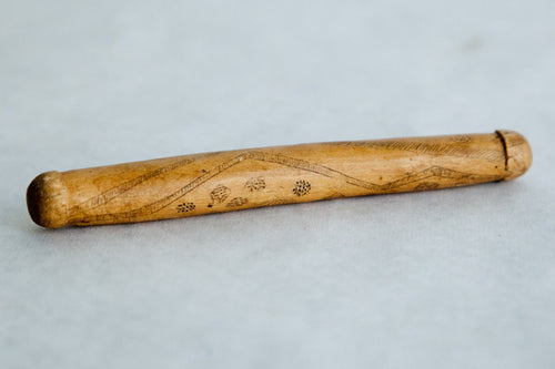 aboriginal message stick with phallic stylized ends