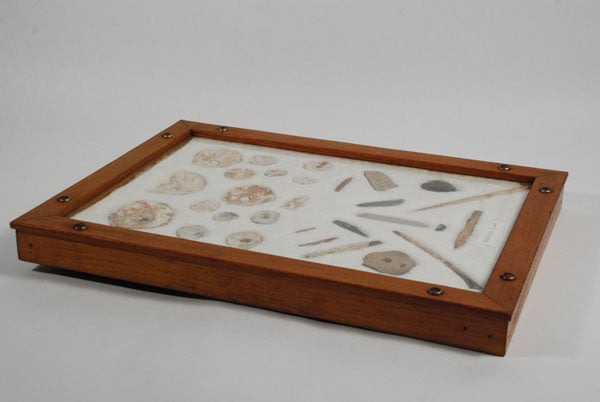 Southern California Indian artifacts in an old frame of prehistoric Chumash