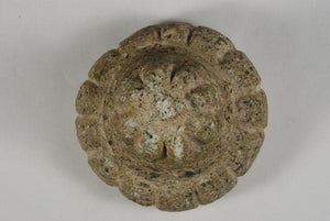 top view of early Bactrian ritual object carved out of conglomerate stone