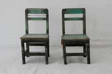 A pair of primitive Chinese children chairs